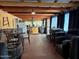 View of an ample space offering living and cooking zones with an abundance of natural light at 17531 Ne 139Th Ave, Fort Mc Coy, FL 32134