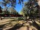 Sprawling property with a utility building and mature trees, offering privacy and abundant space at 17531 Ne 139Th Ave, Fort Mc Coy, FL 32134