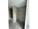 Modern tiled shower with neutral gray tones and a view towards the bathtub area at 1856 9Th Ave, Deland, FL 32724
