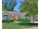 Charming single story home with well-maintained landscaping and a two car garage at 2051 Sherwood Forest Dr, Orange City, FL 32763