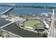 Scenic aerial view of the baseball field, waterways, and waterfront cityscape, showcasing the community's amenities at 208 Wall St # 204, Daytona Beach, FL 32114