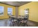Contemporary dining area featuring a stylish table and ample natural light at 208 Wall St # 204, Daytona Beach, FL 32114