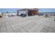 Expansive rooftop patio offering multiple seating areas, dining options, and outdoor cooking facilities at 208 Wall St # 204, Daytona Beach, FL 32114