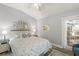 Serene bedroom with a queen-sized bed and natural light at 2163 Fireside Rd, Deltona, FL 32738