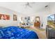 Spacious main bedroom featuring a cozy seating area and ample natural light at 2163 Fireside Rd, Deltona, FL 32738