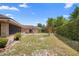 Spacious backyard featuring a red brick patio at 2478 Unionville Dr, Deltona, FL 32725
