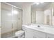 Bathroom with a vanity and a shower with glass doors at 2478 Unionville Dr, Deltona, FL 32725