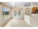 Open dining area with French doors and backyard views at 2478 Unionville Dr, Deltona, FL 32725