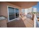 A serene balcony boasts comfortable seating, an outdoor grill, and breathtaking ocean views, creating the perfect retreat at 2515 S Atlantic Ave # 203, Daytona Beach, FL 32118