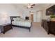 Bright bedroom with furnishings and walkout access to the balcony with ocean view at 2515 S Atlantic Ave # 203, Daytona Beach, FL 32118