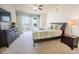 Bright bedroom with furnishings and walkout access to the balcony with ocean view at 2515 S Atlantic Ave # 203, Daytona Beach, FL 32118
