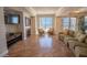 Bright common area with comfortable seating, fireplace, and ocean view at 2515 S Atlantic Ave # 203, Daytona Beach, FL 32118