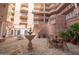 Fountain in courtyard of building complex with tables and chairs for gathering at 2515 S Atlantic Ave # 203, Daytona Beach, FL 32118