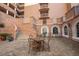 Brick-paved courtyard surrounded by the building, with tables and seating at 2515 S Atlantic Ave # 203, Daytona Beach, FL 32118