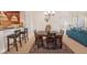 Cozy dining area with bar seating adjacent to comfortable living space at 2515 S Atlantic Ave # 203, Daytona Beach, FL 32118
