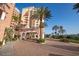 Condominium entrance and driveway with landscaping at 2515 S Atlantic Ave # 203, Daytona Beach, FL 32118