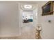 Bright entryway featuring tile floors that leads into dining and living space at 2515 S Atlantic Ave # 203, Daytona Beach, FL 32118