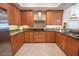 Updated kitchen with granite countertops, stainless appliances, and ample storage at 2515 S Atlantic Ave # 203, Daytona Beach, FL 32118