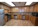 Well-maintained kitchen with stainless steel appliances and ample cabinet space at 2515 S Atlantic Ave # 203, Daytona Beach, FL 32118