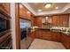 Open kitchen with granite countertops, tiled backsplash, and stainless appliances at 2515 S Atlantic Ave # 203, Daytona Beach, FL 32118