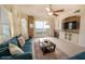 Comfortable living room featuring plush seating, ocean view, and well-placed lighting at 2515 S Atlantic Ave # 203, Daytona Beach, FL 32118
