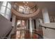 Stunning lobby with a circular balcony, decorative lighting, and tiled flooring at 2515 S Atlantic Ave # 203, Daytona Beach, FL 32118