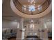 Grand lobby with a decorative railing, elegant lighting, and seating areas at 2515 S Atlantic Ave # 203, Daytona Beach, FL 32118