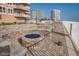 A built-in circular seating area with a fire pit offers a relaxing ambiance for enjoying the coastal scenery at 2515 S Atlantic Ave # 203, Daytona Beach, FL 32118