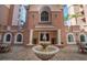 Exterior building with water feature and outdoor seating area at 2515 S Atlantic Ave # 203, Daytona Beach, FL 32118