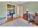 This bedroom features hardwood floors and a closet for ample storage at 2676 Palm Terrace St, Deland, FL 32720
