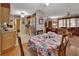 Charming dining area adjacent to kitchen and living room, filled with natural light at 2676 Palm Terrace St, Deland, FL 32720
