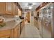 Functional kitchen features stainless steel appliances and tile flooring at 2676 Palm Terrace St, Deland, FL 32720