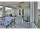 Inviting screened-in porch with comfortable seating at 2676 Palm Terrace St, Deland, FL 32720