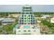 Modern exterior of building with a pool deck overlooking lush landscaping at 2801 Hill St # 801, New Smyrna Beach, FL 32169