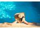 Enjoying the clear, refreshing waters of the pool in a luxurious setting at 2801 Hill St # 801, New Smyrna Beach, FL 32169