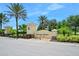 The Portofino Reserve community sign framed by palm trees and lush landscaping at 2825 S Asciano Ct, New Smyrna Beach, FL 32168