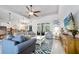 Open-concept living space with modern furnishings and natural light at 2825 S Asciano Ct, New Smyrna Beach, FL 32168
