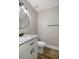 Bathroom featuring a granite countertop, white vanity, toilet, and modern fixtures at 2831 Fifer Dr, Deltona, FL 32738