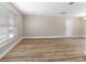 Bright living room featuring hardwood floors and neutral paint at 2831 Fifer Dr, Deltona, FL 32738