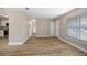 Bright living room featuring hardwood floors and neutral paint at 2831 Fifer Dr, Deltona, FL 32738