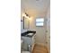 Bathroom with modern black accents, a sink, and a window at 2970 Lantern Dr, South Daytona, FL 32119