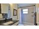 Bathroom with a modern vanity, a sink, and a tub and shower at 2970 Lantern Dr, South Daytona, FL 32119