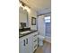 Bathroom featuring a modern vanity and shower/tub combo at 2970 Lantern Dr, South Daytona, FL 32119