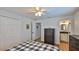 Bright bedroom with a ceiling fan, closet, and ensuite bathroom at 2970 Lantern Dr, South Daytona, FL 32119