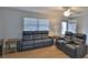 Comfortable living room featuring hardwood floors, neutral paint, and comfortable furniture at 2970 Lantern Dr, South Daytona, FL 32119