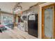 The kitchen offers a blend of functionality and charm with updated appliances, pantry door, and natural light at 3013 Hunkin Cir, Deltona, FL 32738