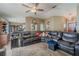 The living room features a spacious seating area with a large, comfortable sectional sofa, perfect for relaxing at 3013 Hunkin Cir, Deltona, FL 32738
