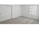 Bright bedroom with a large closet and a neutral carpet at 317 River Front Way, Edgewater, FL 32141