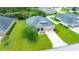 Aerial view of single Gathering home with a well-manicured lawn at 32 Abacus Ave, Ormond Beach, FL 32174