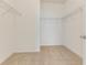 Large walk-in closet with carpet and wire shelving at 32 Abacus Ave, Ormond Beach, FL 32174